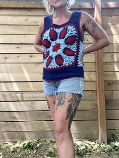 Holy crap this is amazing and special  1970's handmade crocheted tank top  Blue, light blue and red colors  Great pattern and design  Tank sleeves and scoop down pretty low so your bra will definitely hang out  That doesn't bother me but it may to some so it's to be noted  It's in amazing condition  Fits a medium/smaller large there is a little stretch to the yarn  Measurements are approximate and taken flat so please double bust and waist for more accurate sizing  Bust: 17.5 in  Waist: 16 in  L Casual Patchwork Tank Top For Beach, Blue Casual Tank Top For Festival, Casual Blue Tank Top For Festivals, Summer Beach Tank Top With Patchwork, Bohemian Patchwork Tank Top For Summer, Hippie Sleeveless Patchwork Tops, Summer Tank Tops With Patchwork, Bohemian Cotton Crochet Tank Top, Bohemian Blue Tank Top For Beach