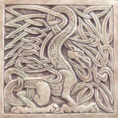 an intricately designed tile in the shape of a lion with celtic designs on it