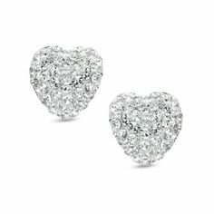 Simple yet sparkling, these stud earrings are a fabulous anytime look. Fashioned in sleek sterling silver, each slightly puffed heart is completely set with shimmering white crystals that catch and reflect the light with every turn of the head. Polished to a brilliant shine, these post earrings secure comfortably with friction backs. Gifts Corporate, Gift For Graduation, Puffed Heart, Heart Stud Earrings, White Crystals, Heart Studs, Heart Earrings Studs, Crystal Heart, Sterling Silver Earrings Studs