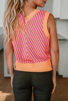 Get ready for some serious summer vibes with our Summer Slush Knit Sleeveless Vest! Made from a soft knit fabric, this vest features a bright and playful pink orange combo that will add a pop of color to any outfit. Stay cool and stylish all season long with this must-have piece. (No brain freeze included!) Available in Small, Medium and Large Runs true with a straight, easy fit Cheap Knitted Summer Vest, Cheap Sleeveless Summer Sweater, Spring Open Knit Sweater Vest, Cheap Knit Vest For Summer, Knit Vest Multi Color, Brain Freeze, Sleeveless Vest, Stay Cool, Soft Knits