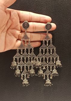 Beautiful Long Penjabi Indian Earrings. Traditional Indian Earrings. Anniversary/Wedding/Party Wear Earrings. Handmade Jewellery. Made in India. Metal - Alloy. Length size - 12.9 cm. Width size - 6 cm. Stud Width - 1.5 cm. Both Earrings Total weight - 44 Grams. Each Side Earrings weight - 22 Grams. Elegant Dangle Jhumkas For Festivals, Bohemian Oxidized Chandelier Earrings For Wedding, Bohemian Chandelier Earrings With Oxidized Finish For Wedding, Bohemian Dangle Bridal Earrings, Bohemian Style Bridal Dangle Earrings, Bohemian Bridal Dangle Earrings, Party Plug Drop Earrings With Latkans, Party Drop Plug Earrings With Latkans, Party Drop Earrings With Latkans