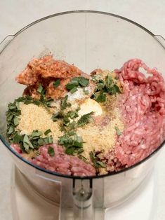 meat and spices in a food processor ready to be blended into soup or sauces