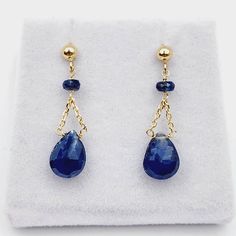 14K Yellow Gold Drop Earrings Natural Blue Sapphire 3cts Drop length: 0.78 inches (20mm) - Size of small stone: 2x3mm - Size of big stone: 8x6mm Made in Canada * Comes in a Beautiful Gift Box | Perfect for Gifting ------------------------------------------------ * Please click here to visit my shop: https://www.etsy.com/shop/bestjewelryset * To see more earrings please check out the link below: https://www.etsy.com/shop/BestJewelrySet?section_id=35656287 Sapphire Briolette Gemstone Earrings, 14k Gold Sapphire Gemstone Earrings, Sapphire Earrings For Pierced Ears, Blue Sapphire Pear-shaped Earrings, Sapphire Dangle Earrings, Yellow Gold Sapphire Drop Earrings, Blue Briolette Earrings Fine Jewelry, Sapphire Pear-shaped Earrings For Gift, Blue Briolette Gemstone Earrings