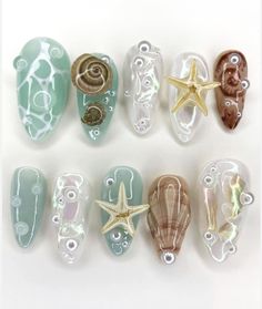 Dive into summer with our Starfish Snails Sea Vacation press-on nails. These custom beach seashell fingernails capture the essence of a seaside getaway, combining unique designs with durability. Perfect for those seeking trendy, reusable nail enhancements that evoke the magic of a beach vacation. 📦 What comes with your press on nail kit? 10 nails of your size 24 adhesive tabs 1 nail file 1 cuticle stick Instructions on how to apply and remove them. Finding Your Size:Check out our sizing chart o Beach Themed Nails, Sea Vacation, Futuristic Style, Beach Design, Beauty Nail, You're Awesome, Nail Sizes, 3d Nails, Nail Kit