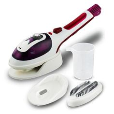 a white and red electric toothbrush next to a cup with a brush in it