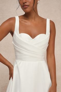 With a timeless silhouette and an undeniably romantic personality, the Lulus Modern Affection White Taffeta Pleated Sleeveless Maxi Dress is the perfect dress for your big day! Sleek and structured woven taffeta shapes wide straps that support a bodice with a classic sweetheart neckline, lightly padded cups, and a crisscrossing pleated design that lends a contemporary touch to this gorgeous dress. Fitted waist tops a full, ballgown-style skirt that has a layer of hidden tulle for volume. Low bac Classic Sleeveless Dress With Ruched Bodice, Sleeveless Wedding Dress With Pleated Back, Sleeveless Bridesmaid Dresses With Boned Bodice, Elegant Fitted Dress For Wedding Reception, Elegant Sleeveless Dress With Bust Darts, Elegant Wedding Dress With Bust Darts, Sleeveless Dress With Ruched Bodice For Wedding, White Ballgown, Neutral Dresses