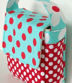 a red and blue polka dot lunch bag