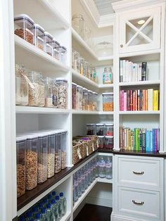 the pantry is stocked with many different types of food and drinks, including cereals