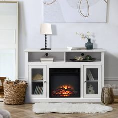 a living room with a fire place in the center and a rug on the floor