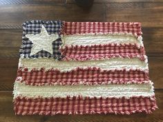 an american flag made out of old fabric