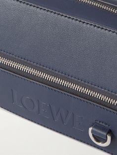 Loewe's belt bag elegantly showcases the sleek, architectural lines the house is known for. It's cut from supple leather in an elongated, hexagonal shape and has space enough for your essentials plus sunglasses and maybe a little bottle of aftershave, too. Wear it at the waist or sling it over the shoulder when you're on the move. Belt Bag For Men, Loewe Logo, Tom Ford Bag, Leather Belt Bag, Luxury Sneakers, Aftershave, Stylish Watches, Fine Jewelry Designers, Classic Sneakers