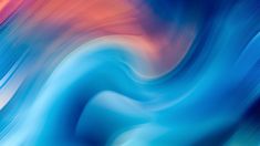 an abstract painting with blue, red and orange colors in the background that is blurry