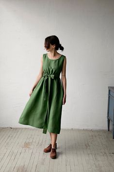 Sleeveless dress is made from 100% soft and washed linen.  Details: - Colour: Apple Green - Composition: 100% Oeko-Tex certified linen - A line style - Pockets - Linen belt included - Medium weight linen - Linen care: machine wash gentle; tumble dry low, ironing optional - The price is for one dress, other pictured items are not included Green Linen Sleeveless Summer Dress, Casual Green Ramie Dress, Linen Sleeveless Sundress, Green Sleeveless Linen Dress, Green Midi Linen Dress, Green Linen A-line Midi Dress, Green A-line Linen Midi Dress, Green Sleeveless Linen Dress For Spring, Green Sleeveless Linen Dress For Summer