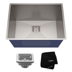 a stainless steel kitchen sink and accessories