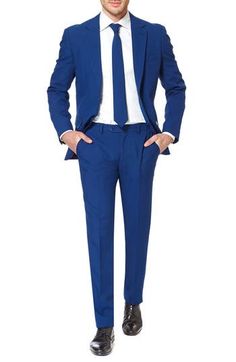 Don't let the blues get you down in this matching solid color ensemble. Tailored for the office but made for partying, a slim-fitting suit jacket, creased trousers and necktie match in a bright blue fit for royalty—or the suave fellows who protect them. Jacket has a two-button closure, notch lapels; nonfunctional four-button cuffs; chest pocket; front flap pockets; side vents. Trousers have a zip fly with button-tab closure; front slant pockets; back welt pockets. Fully lined. 100% polyester. Dr Wedding Suits Men Blue, Royal Blue Suit, Suit Tie, Tall Pants, Blue Fits, Fitted Suit, Wedding Suits Men, Tie Set, Simply Vera Wang