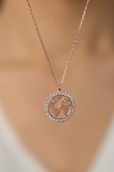 We have a crush on this glam yet delicate world map necklace. If you love the world you live in and if you love travelling, this necklace it the best way to express yourself!  That dainty and elegant world map necklace is a very strong candidate to be your all time favourite! Hypo-allergenic, lightweight and minimalist. That jewelry would also make a perfect gift for women 💖🎁 💫Listing is for 1 world map necklace. 💎Made with 925 sterling silver and plated 14K rose gold and paved with shiny Zi Elegant Silver Jewelry For Travel, Elegant Sterling Silver Necklace For Travel, Sterling Silver Necklace With Round Pendant For Travel, Sterling Silver Round Pendant Jewelry For Travel, Globe Necklace, Necklace Travel, World Map Necklace, Travel Necklace, Map Necklace