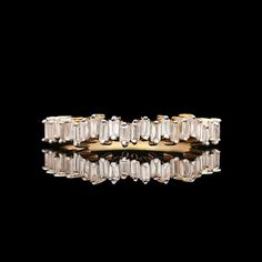 A 14k yellow gold baguette cut 0.30 ctw Diamond eternity band. SR1763 Weight: 2.20 grams (Inclusive of all materials) Ring Size: 6 Diamonds Baguette Cut Color: H - I Clarity: I1 Carat Weight: 0.30 ctw Elegant Gold Baguette-cut Jewelry, Luxury 14k Gold Baguette Cut Eternity Band, Gold Baguette-cut Half Eternity Jewelry, Gia Certified Gold Baguette-cut Ring, Luxury Baguette-cut Eternity Band With Diamond Accents, Baguette Cut Ring, Gold Diamond Drop Earrings, Opal Ring Gold, Aquamarine Earrings