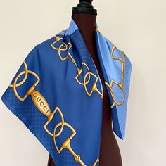 Authentic Gucci Logo Horsebit Chains Color-Block Blue/Sky Blue Silk Scarf The Scarf Is New From Display. It Has A Few Minor Pulls. Please Check Last Two Pictures. 100% Silk Twill Square Shape Size 35" X 35" Inches Hand-Finished Rolled Edges Gucci Logo On The Bottom Style # 281602 Made In Italy The Scarf Will Be Wrapped With Original Gucci Tissue Paper. Shipping Next Business Day How To Wear Silk Scarf: As A Silk Head Scarf/Bandana: Tied Around As A Silk Head Wrap For A Classic Look. As A Neck Sc Gucci Silk Scarf, Silk Head Wrap, Pattern Scarf Silk, Luxury Blue Silk Scarf, Luxury Blue Rectangular Silk Scarf, Luxury Artistic Blue Scarves, Luxury Artistic Blue Silk Scarf, Blue Silk Scarf, Silk Headscarf