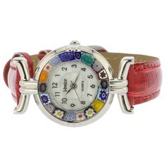 This elegant Murano glass watch is a unique timepiece featuring high-quality workmanship and the most famous Murano technique- Millefiori (a thousand flowers)- which has become a trademark of Murano glass making. Stylized flowers in beautiful colors grace the hand-made face of this watch and give it a trendy and unmistakably Venetian look. This Murano watch adds a perfect accent to any wardrobe and works equally well for your casual outing or a night on the town. Measurements: The face of this M Red Nail Varnish, Heart Christmas Ornaments, Italian Leather Handbags, Murano Glass Jewelry, Italian Bags, Glass Making, Glass Christmas Tree Ornaments, Handmade Handbags, Elegant Accessories