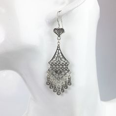 Handmade 925 Sterling Silver Artisan Crafted Filigree Ornate Chandelier Earrings  Material: 925 Solid Sterling Silver, 925 Stamped Earrings Length: 2.75 inches Width: 0.80 inches Closure: Ear wire with safety catch Finishing: Oxidized and Polished Comes with a gift pouch and box Free Domestic Shipping We hope that you enjoy our exclusive artisan handcrafted jewelry. Ornate Chandelier, Statement Chandelier, Stamped Earrings, Silver Chandelier Earrings, Silver Chandelier, Stylish Earrings, Jewelry Accessories Ideas, Accessories Ideas, Stylish Earring