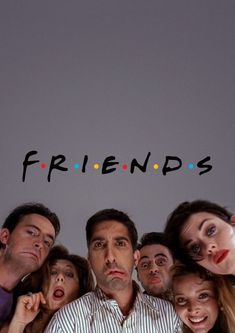 a group of people standing next to each other in front of a sign that says friends