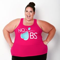 a woman in a pink tank top with no bss on it