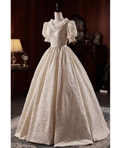 Get 10% off now! Buy ivory vintage ballgown wedding dress vneck with short sleeves at cheap price online. Free stable shipping and pro custom service since 2009. Ball Gown Wedding Dress With Puffy Sleeves, 1850s Wedding Dress, Vintage Wedding Dress Ballgown, Elegant Short Sleeve Wedding Ball Gown, Elegant Short Sleeve Gown For Debutante Ball, Classic Victorian Wedding Dress With Fitted Bodice, White Victorian Wedding Dress With Short Sleeves, Elegant White Victorian Dress With Short Sleeves, Short Sleeve Victorian Wedding Dress