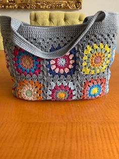 Granny spuare bag. Crochet grey tote bag. color cotton with lining. Gray Rectangular Cotton Shoulder Bag, Rectangular Gray Cotton Shoulder Bag, Gray Cotton Rectangular Shoulder Bag, Square Cotton Crochet Bag For Daily Use, Rectangular Gray Shoulder Bag For Shopping, Gray Rectangular Shoulder Bag With Handles, Gray Rectangular Shoulder Bag For Shopping, Square Crochet Bag For Daily Use, Rectangular Granny Square Beach Bag