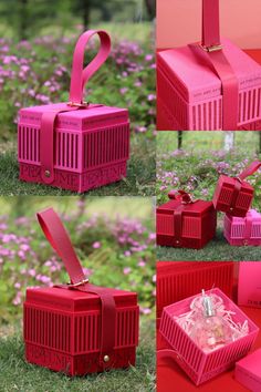 pink boxes with ribbons tied to them sitting in the grass