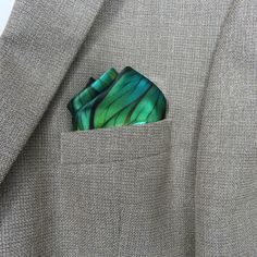 "Generative leaves make a fascinating pattern in vivid green across this 100% silk pocket square. Art-to-wear on very high quality silk satin with a hand-rolled hem.   Add on an optional polyethylene Pocket Square Holder to help with keeping your fancy fold in place! It will be shipped with your pocket square. Keep your look crisp at weddings or events even if you aren't a frequent pocket-square wearer. * Digitally printed original design * 100% silk satin * Approx. 17\" square  * Hand-rolled he Green Pocket Square For Formal Occasions, Classic Green Pocket Square For Business, Green Silk Scarf For Formal Occasions, Formal Green Silk Scarf, Green Formal Pocket Square Handkerchief, Formal Green Pocket Square Handkerchief, Green Pocket Square, Silk Pocket Square, Square Art