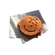 a cookie with a smiley face on it