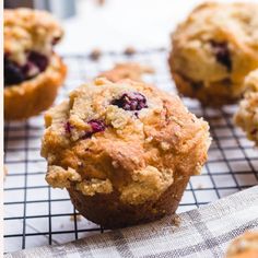 blueberry muffins on a cooling rack ready to be eaten for breakfast or dessert