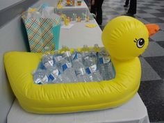 an inflatable ducky filled with bottled water