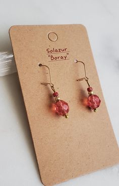 Solazur earrings "Boray" --- Modern. Comfortable. Joyful. So beautiful and so dainty earrings, made to add joy and style to your outfit. Lightweight, you forget you have them on. Hypoallergenic.  Made in three colors to coose from, each pair has its own pop of color and gorgeous shine.  ◇golden brown amber tone ◇ocean aqua tone ◇strawberry pink tone Perfect summer accessory, elegant and charming. Earrings are made with 14K gold filled wire and high quality European made glass and accent beads. S Dangle Crystal Earrings With Czech Glass For Gift, Czech Glass Dangle Crystal Earrings For Gift, Czech Glass Crystal Dangle Earrings As Gift, Czech Glass Earrings As A Gift, Wire Wrapped Beaded Earrings As Gift, Czech Glass Round Earrings For Gifts, Round Czech Glass Earrings For Gifts, Pink Crystal Ear Wire Earrings For Gift, Party Czech Glass Crystal Earrings With Ear Wire