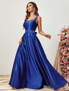 Product Code: FSWD1337 Embellishment: Satin Fabric: 100% Polyester Back Style: Zipper Up Fully Lined: Yes Built-in Bra: No Available Color: Royal Blue Stretch: Moderate Fits true to size Imported Model Information: Height: 5' 2" Bust: 33.5'' Waist: 24“ Hips: 35.5” wearing US size Small Blue A-line Sleeveless Dress For Wedding, Royal Blue Sleeveless Satin Dress, Blue A-line Sleeveless Prom Dress, Royal Blue Sleeveless Banquet Dress, Royal Blue Sleeveless Dress For Banquet, Sleeveless Royal Blue Banquet Dress, Royal Blue Sleeveless Maxi Dress For Wedding, Royal Blue Sleeveless Maxi Dress For Formal Occasions, Elegant Blue A-line Sleeveless Dress