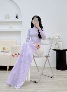 🌸 Material: Lụa gấm. Stretchy level: 4/10 🌸 The measurement of this ao dai is in Vietnamese size. American size tends to be bigger for the same size. Please look at the SIZE CHART CAREFULLY before ORDERING. There might have some chalk writings on the fabric, these marks can be washed away. 🌸 No returns or exchanges. Buyer can contact seller about any issues with an order. 🌸 Follow us Facebook/aodaiemily www.aodaiemily.com 💜 Thank you very much💜 Elegant Fitted Purple Ao Dai, Traditional Lavender Fitted Dress, Spring Purple Ao Dai, Purple Long Sleeve Ao Dai For Spring, Vietnamese Dress Ao Dai, Chalk Writing, Vietnamese Dress, Level 4, Pastel Purple