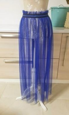 Tulle, blue, trend, sheer, transparent and fashion skirt. It is worn over tight dresses. shirts, skirts, jeans. Color: blue, black Size: M, L, Xl Lenght: 43" The length of the skirt can be shortened by itself. Sheer Blue Party Bottoms, Blue Party Tulle Skirt Bottoms, Long Blue Mesh Skirt, Spring Sheer Nylon Skirt, Sheer Blue Mesh Tops, Transparent Fashion, Skirts Jeans, Polka Dot Skirt, Dot Skirt