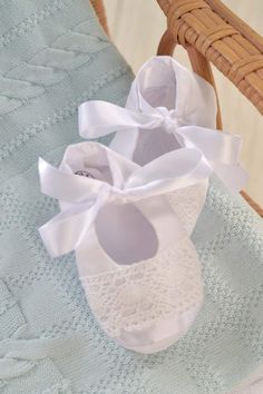 Cover your baby’s toes to complete the Christening outfit with these darling all white or all ivory 100% cotton booties. With precious lace across the toe and a satin ribbon tie, this bootie coordinates well with most christening gowns especially Charlotte and Quinn. Satin ribbon tie keeps bootie in place with a gentle touch, no irritating elastic. One size fits approximately sizes newborn to nine months. Makes a wonderful Christening and new baby gift. Lace Booties, Christening Outfit, Christening Gowns, Gentle Touch, New Baby Gift, Baby Hacks, Ribbon Tie, New Baby Gifts, Satin Ribbon