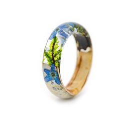 Introducing the ring with Forget-Me-Not Flowers. Materials: Resin, Birch, Grey forest moss, Green moss, Forget-me-not flowers, Gold24K Forget-me-not in the language of flowers means memory and fidelity. Birch - a tree symbolizing spring and resurrection, the embodiment of heavenly radiance, light, is considered a sacred tree. Custom orders are welcome. Every item comes in a beautiful, individual original box ready for gift giving. Natural VyTvir rings are made with great love for nature If you h Blue Nature-inspired Ring For Gift, Nature-inspired Blue Ring Jewelry, Blue Nature-inspired Jewelry Ring, Blue Flower Jewelry With Natural Inclusions, Blue Flower Ring For Gift, Unique Blue Flower Ring For Gift, Gold Rings With Pressed Flowers For Wedding, Handmade Blue Flower Ring For Anniversary, Gold Ring With Pressed Flowers