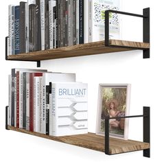 two wooden shelves with books and magazines on them, one has a black metal shelf