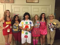 a group of people dressed up in costumes