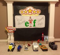 toy cars and trucks are lined up in front of a sign that says eff