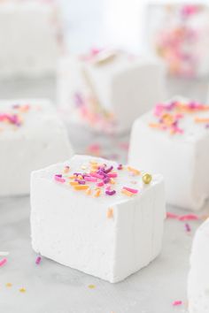 white marshmallows with sprinkles and confetti on them