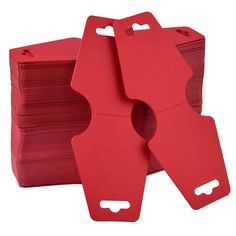 red paper tags stacked on top of each other