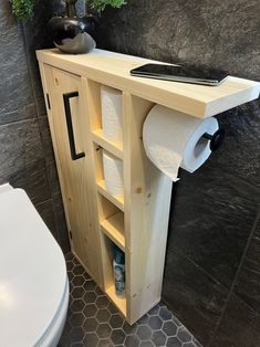 there is a toilet paper roll holder in the bathroom