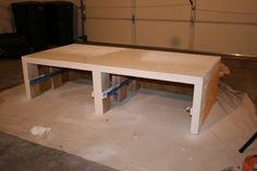 a table being built in a garage