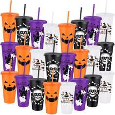 halloween cups with pumpkins and jack - o'- lanterns on them are lined up