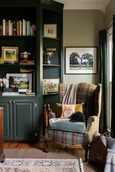 a living room filled with furniture and bookshelves