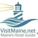 the logo for visit maine net marine's hotel guide, which features a lighthouse and waves