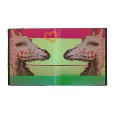 two giraffes are facing each other on a multicolored card case